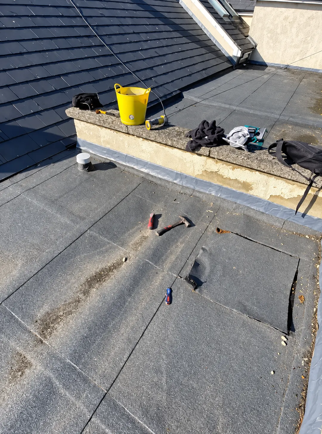 Flat roof maintenance and inspection